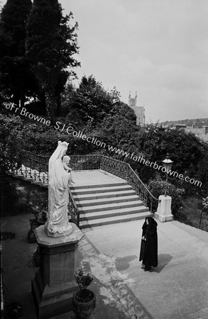 WEST GABLE - PRAYING AT STATUE B.V.M. WHERE B. WALLS ONCE STOOD